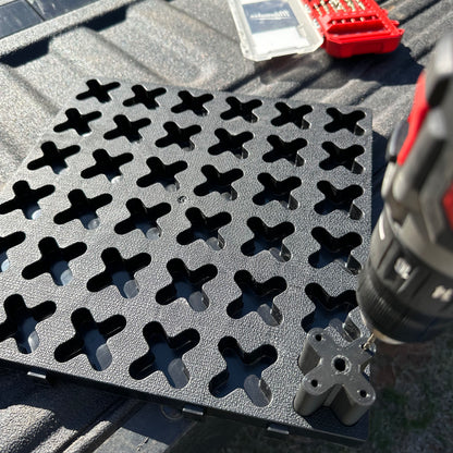 Using a Tmat Drill Guide to drill a hole into a Tmat.