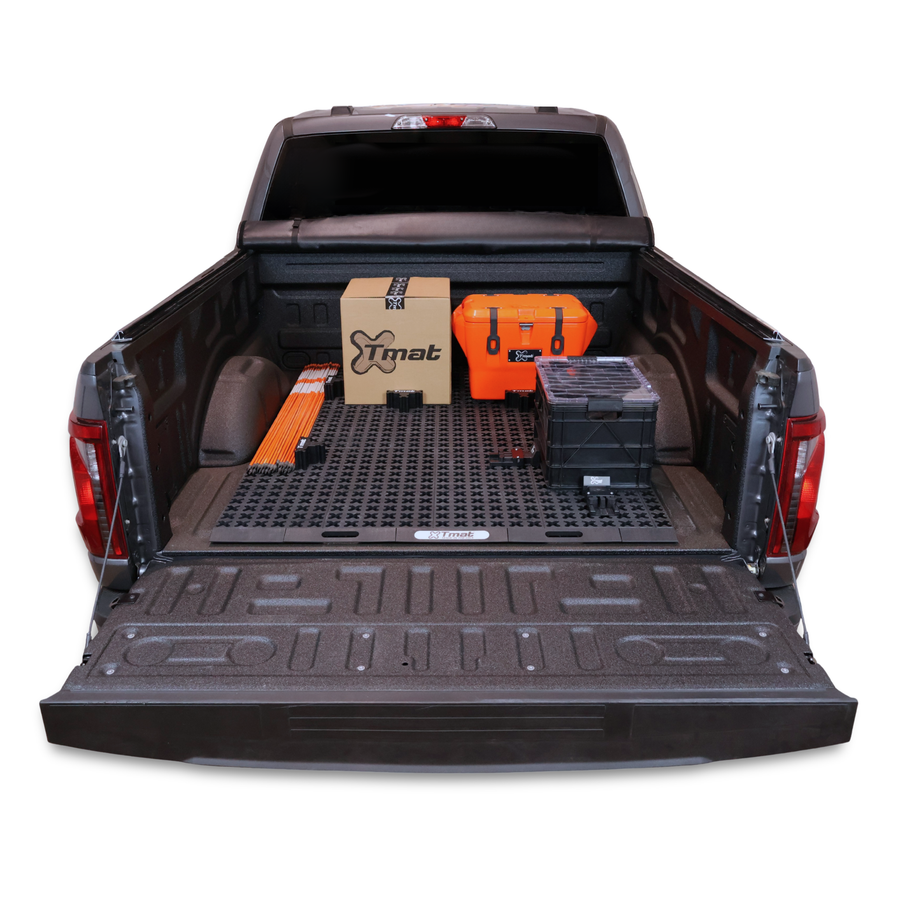 Tmat truck bed organizer sliding out onto tailgate with organized gear